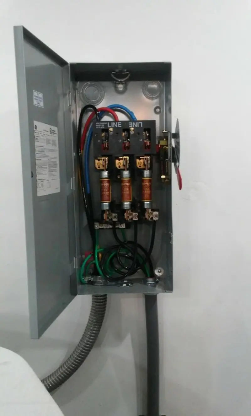 Three-phase disconnect switch installed for Smoke Detector Installation in Harding