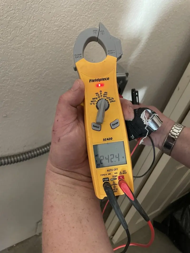 Voltage testing with clamp meter during Generator Installation in Harding